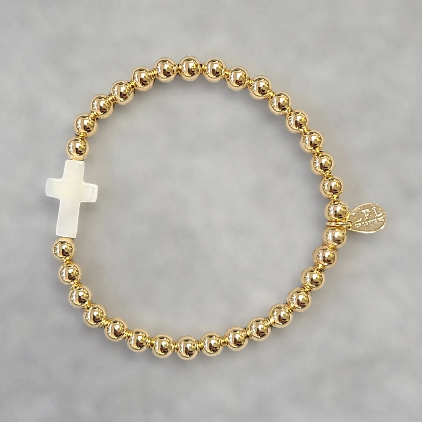 Gold Beaded Bracelet with Pearl Cross