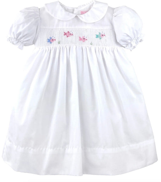 White dress with smocked pink fish