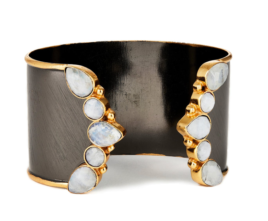 Cuff bracelet with white stones and gold trim