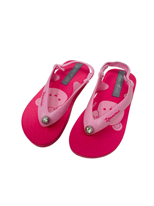 Bright pink flip flop with rhinestone